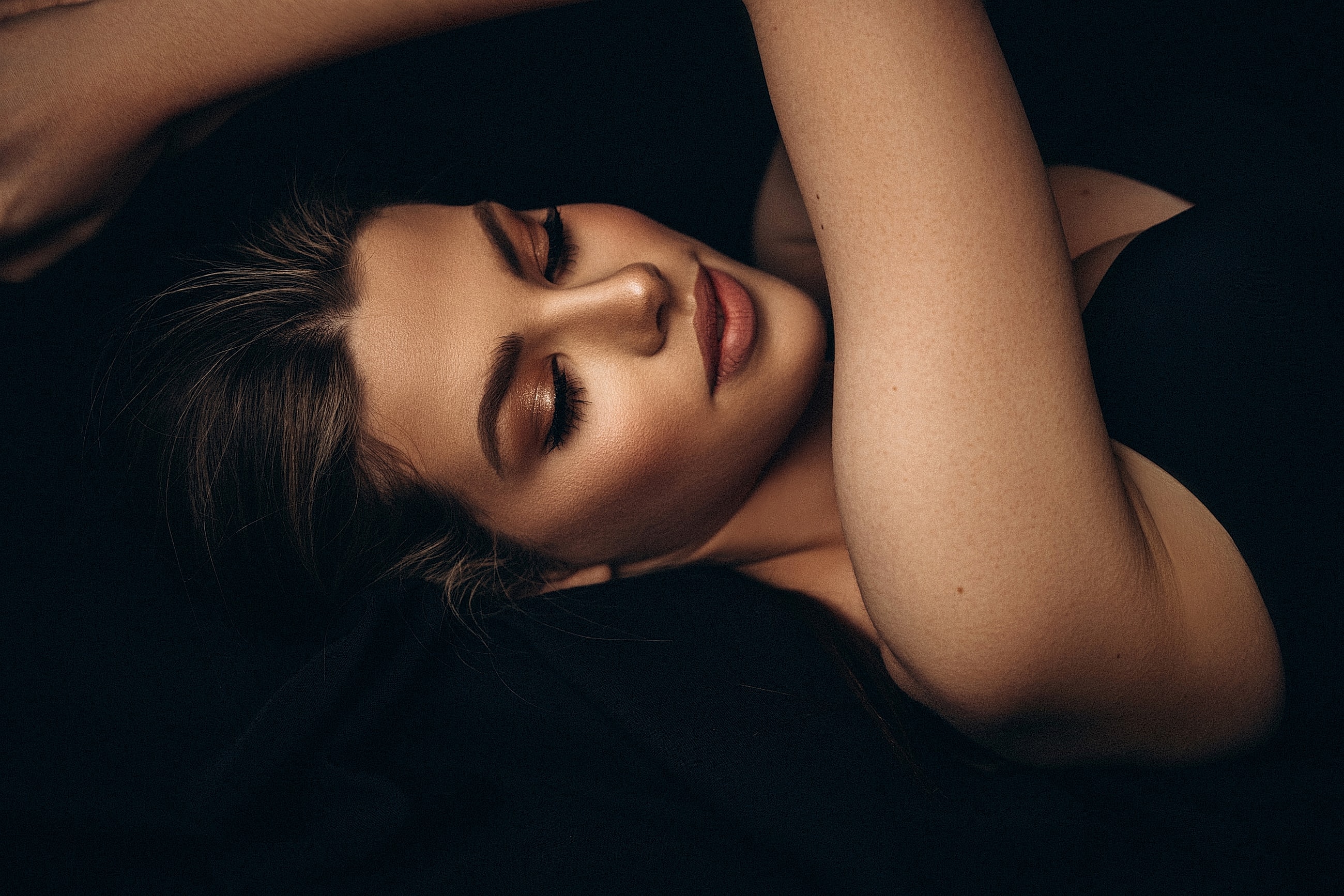 Close-up portrait of a serene woman.